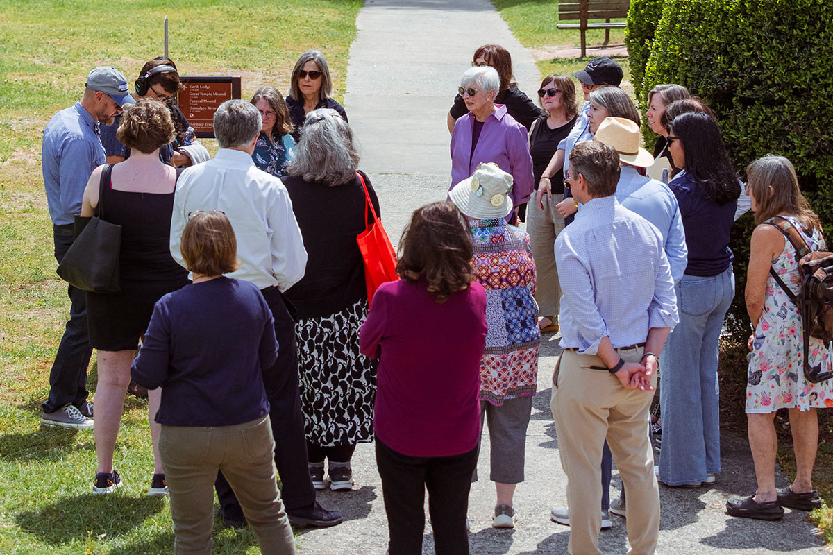 Tour participants gather on a sunny day for an immersive tour led by Joy Harjo, Dr. Matt Jennings, and Owen “Chopoksa” Sapulpa. Courtesy of Georgia Humanities, photo by Jessica Whitley.
