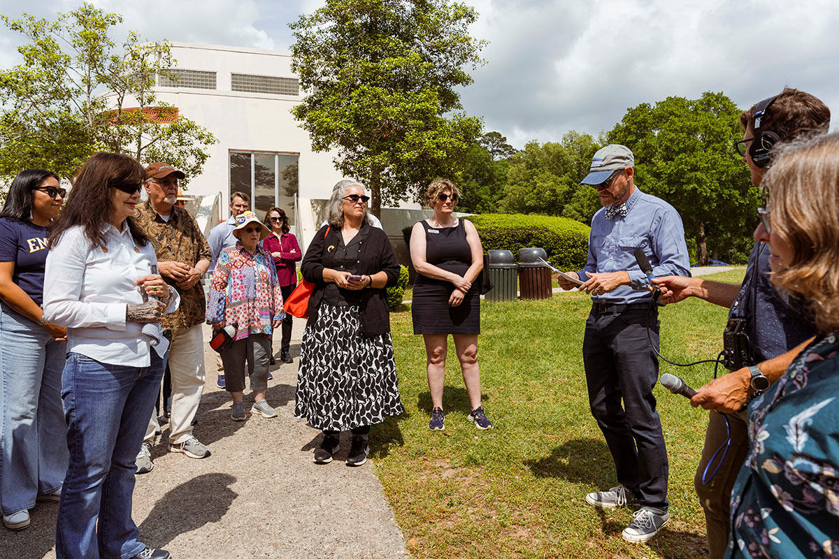 A group of participants gathered for an immersive tour in Ocmulgee Mounds National Historical Park, a site of continuous human habitation sacred to the Muscogee (Creek) Nation. Courtesy of Georgia Humanities, photo by Jessica Whitley.