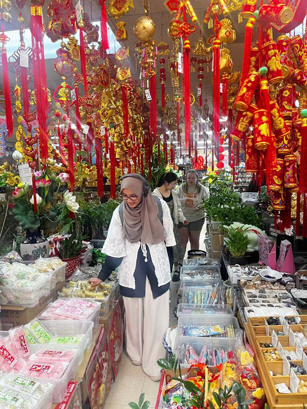 Participants browse the colorful aisles of a supermarket in the Far East Center. Photo by Rose Campbell.