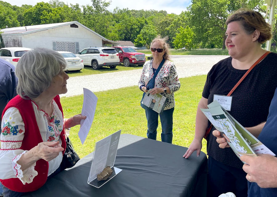 Dr. Alex Hagen chats with fellow German volunteer Barbara Hodson. Photo courtesy of Historic Cane Hill.
